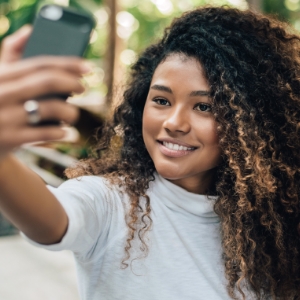 Teenage girl taking a selfie