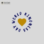 Yellow heart with text wrapped around it that says World Kindness Day