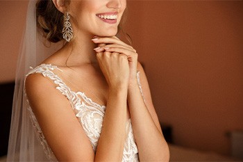 Bride smiling in a wedding dress